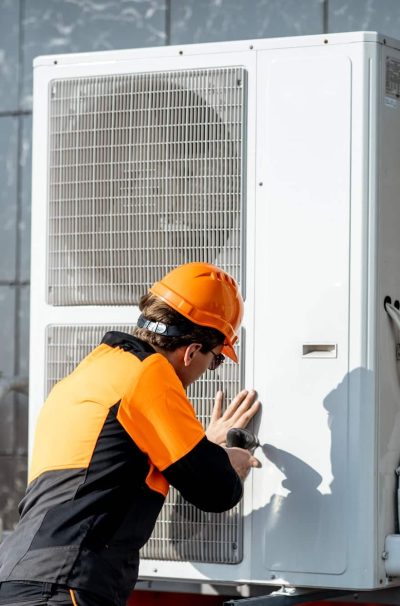 workman-installing-outdoor-unit-of-the-air-conditioner.jpg